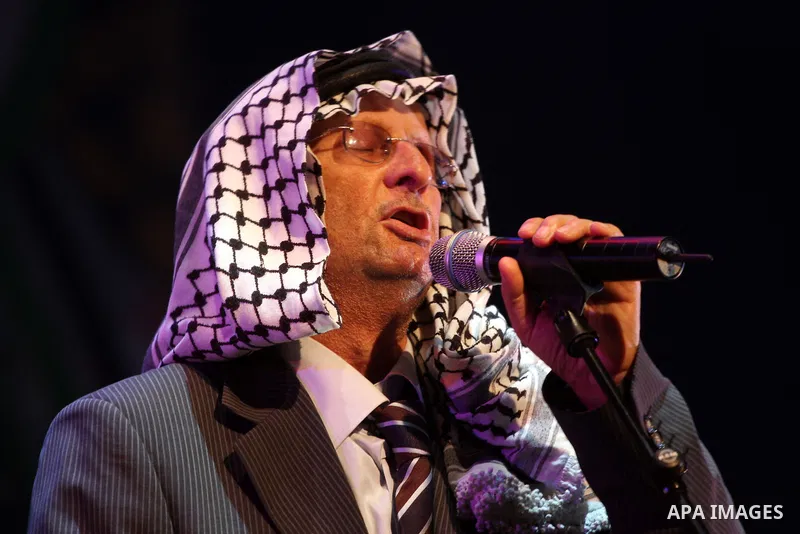 Palestinian revolution poet Ibrahim Abu Saleh ''Abu Arab" participates in a celebration in the West Bank city of Ramallah, Sunday, May 8, 2011 to commemorate the 63rd anniversary of Nakba, or catastrophe, the Arabic term...