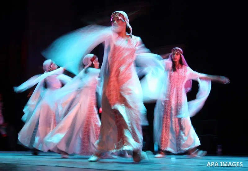 Palestinians, from Lebanon refugee camps, perform traditional dancing Dabka during a celebration at the Cultural Palace in the West Bank city of Ramallah on May 8,2011. Photo by Issam Rimawi