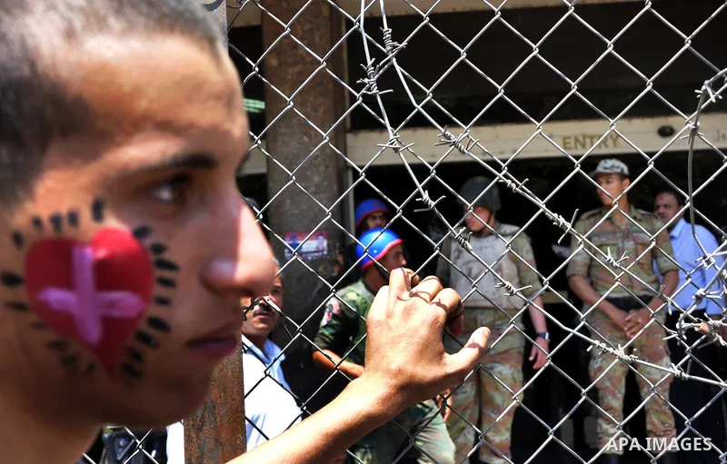 Egyptian Christians protest in front of the state television building in Cairo on May 9, 2011 against recent attempts to trigger sectarian conflict in the country, as the government has vowed to use an "iron fist" to ens...