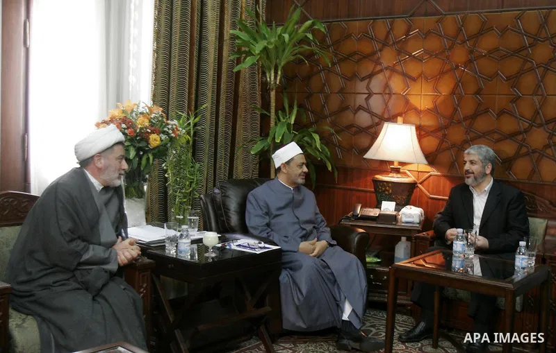 Hamas leader Khaled Mashaal meets with Ahmed al-Tayyeb, the sheikh of al-Azhar, the highest Islamic Sunni institution, during his visit in Cairo, Egypt, Monday, May 9, 2011. Photo by Ahmed Asad