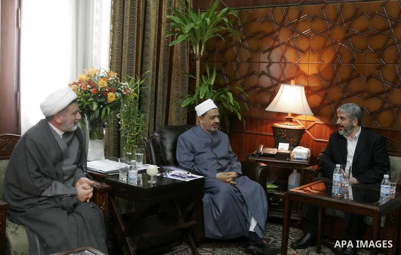 Hamas leader Khaled Mashaal meets with Ahmed al-Tayyeb, the sheikh of al-Azhar, the highest Islamic Sunni institution, during his visit in Cairo, Egypt, Monday, May 9, 2011. Photo by Ahmed Asad