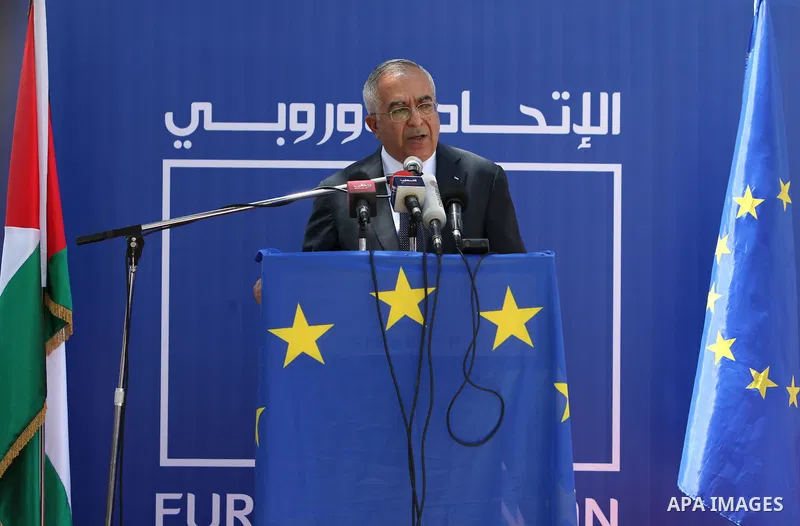 Palestinian Prime Minister, Salam Fayyad participates in a celebration to mark "Europe Day" in the West Bank city of Ramallah on May 9, 2011. France announced it would donate 10 million euros to the Palestinian Authority...