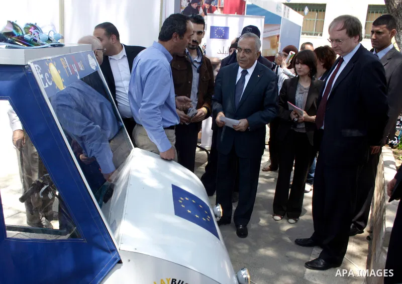 Palestinian Prime Minister, Salam Fayyad participates in a celebration to mark "Europe Day" in the West Bank city of Ramallah on May 9, 2011. France announced it would donate 10 million euros to the Palestinian Authority...