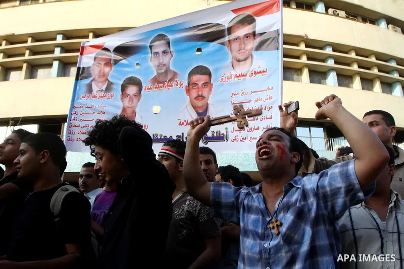 Egyptian Christians protest in front of the state television building in Cairo on May 9, 2011 against recent attempts to trigger sectarian conflict in the country, as the government has vowed to use an "iron fist" to ens...