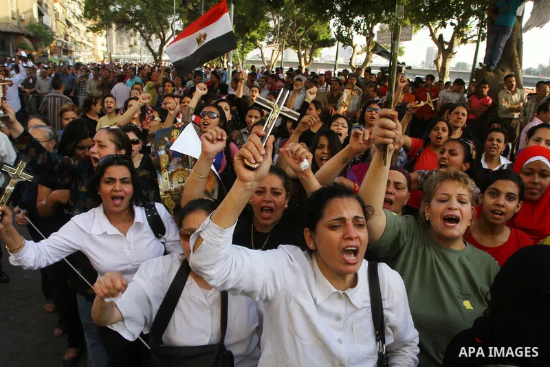 Egyptian Christians protest in front of the state television building in Cairo on May 9, 2011 against recent attempts to trigger sectarian conflict in the country, as the government has vowed to use an "iron fist" to ens...