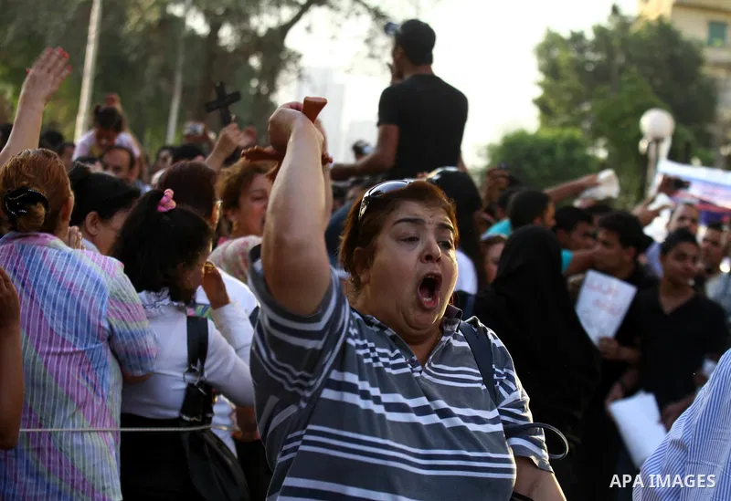 Egyptian Christians protest in front of the state television building in Cairo on May 9, 2011 against recent attempts to trigger sectarian conflict in the country, as the government has vowed to use an "iron fist" to ens...