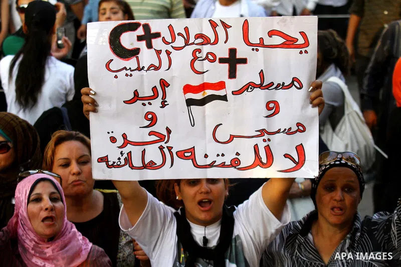 Egyptian Christians protest in front of the state television building in Cairo on May 9, 2011 against recent attempts to trigger sectarian conflict in the country, as the government has vowed to use an "iron fist" to ens...