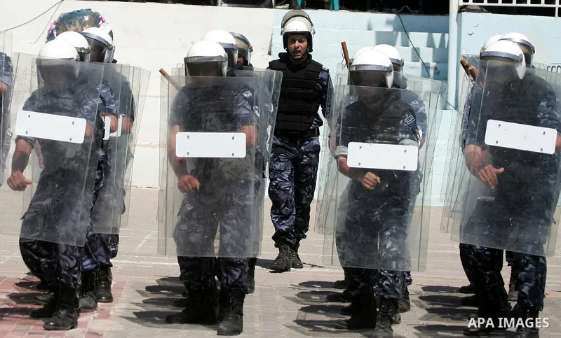 Palestinian Hamas security forces show their skills during a graduation ceremony at the Arafat police compound in Gaza City on May 10, 2011. Photo by Mohammed Othman