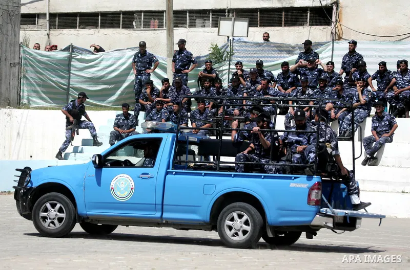 Palestinian Hamas security forces show their skills during a graduation ceremony at the Arafat police compound in Gaza City on May 10, 2011. Photo by Mohammed Othman