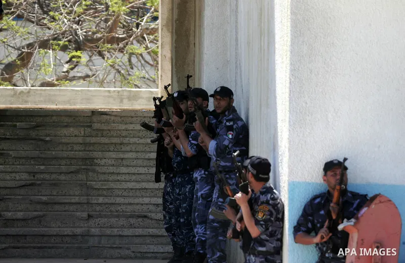 Palestinian Hamas security forces show their skills during a graduation ceremony at the Arafat police compound in Gaza City on May 10, 2011. Photo by Mohammed Othman