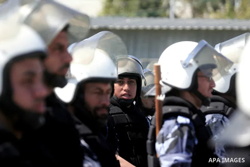 palestinian Hamas security forces march with their riot gear during a graduation ceremony at the Arafat police compound in Gaza City on May 10, 2011. Photo by Mohammed Othman