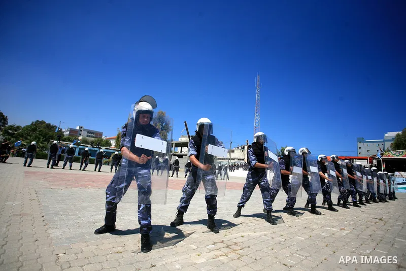 Palestinian Hamas security forces show their skills during a graduation ceremony at the Arafat police compound in Gaza City on May 10, 2011. Photo by Mohammed Othman