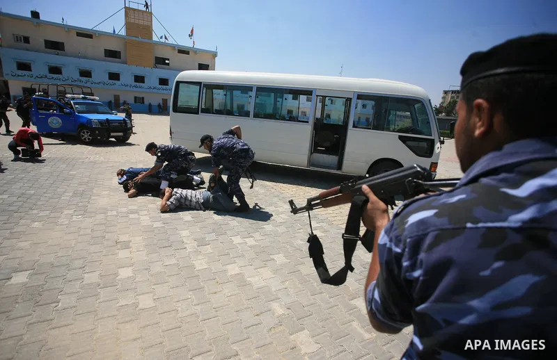 Palestinian Hamas security forces show their skills during a graduation ceremony at the Arafat police compound in Gaza City on May 10, 2011. Photo by Mohammed Othman