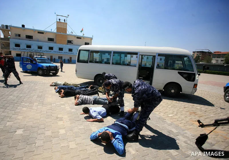 Palestinian Hamas security forces show their skills during a graduation ceremony at the Arafat police compound in Gaza City on May 10, 2011. Photo by Mohammed Othman