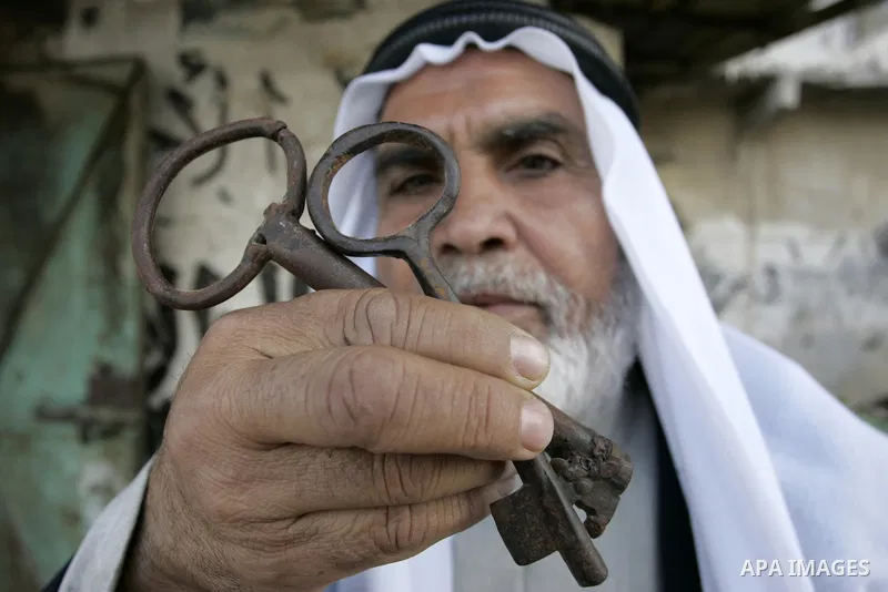 A Palestinian refugee, Hammad Ali al-Akhras, 67 years old, from the Rafah refugee camp, holds up a key allegedly from his house in Wadi Hanin, now located in Israel on May 10, 2011. Palestinians commemorate the 63rd anni...