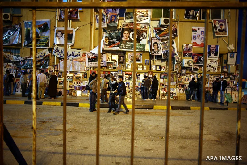 Libyans gather outside the Libyan eastern city Ajdabiya on May 10, 2011, where fighting between rebels and forces loyal to leader Moamer Kadhafi is ongoing. Photo by Wissam Nassar