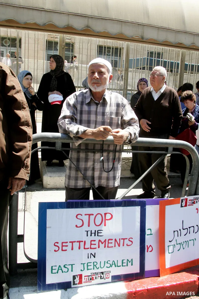 Palestinians participate in a demonstration supporting Palestinians evicted from their homes in the east Jerusalem on May 11, 2011, outside Jerusalem District Court against the city's plan to destroy homes in Silwan neig...