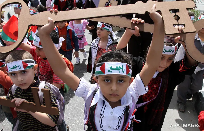 Palestinian children take part in a Nakba rally in Gaza City May 12, 2011. Palestinians will mark "Nakba" (Catastrophe) on May 15 to commemorate the time when hundreds of thousands of Palestinians were expelled or fled f...