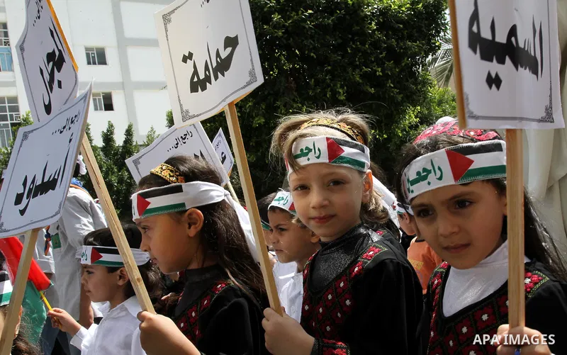 Palestinian children take part in a Nakba rally in Gaza City May 12, 2011. Palestinians will mark "Nakba" (Catastrophe) on May 15 to commemorate the time when hundreds of thousands of Palestinians were expelled or fled f...