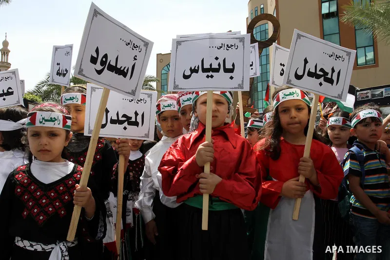 Palestinian children take part in a Nakba rally in Gaza City May 12, 2011. Palestinians will mark "Nakba" (Catastrophe) on May 15 to commemorate the time when hundreds of thousands of Palestinians were expelled or fled f...
