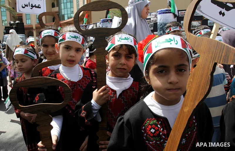 Palestinian children take part in a Nakba rally in Gaza City May 12, 2011. Palestinians will mark "Nakba" (Catastrophe) on May 15 to commemorate the time when hundreds of thousands of Palestinians were expelled or fled f...