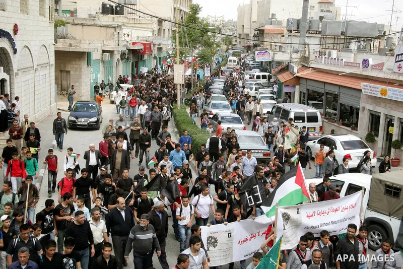 Palestinians take part in a demonstration to mark the 63th anniversary of "Nakba" (catastrophe), in the West Bank city of Bethlehem, on May 12, 2011. Nakba means "catastrophe" in reference to the birth of the state of Is...