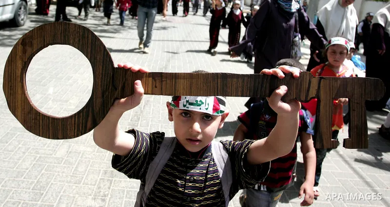 Palestinian children take part in a rally marking the 63rd anniversary of the 'Nakba', or 'Catastrophe', in Gaza City, Thursday, May 12, 2011. Hundreds of thousands of Palestinians were uprooted in the 1948 war that led...