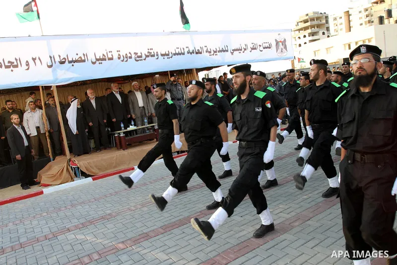 Palestinian Hamas security forces march during a graduation ceremony at the Ansar police compound in Gaza City on May 12, 2011. Photo by Mohammed Asad