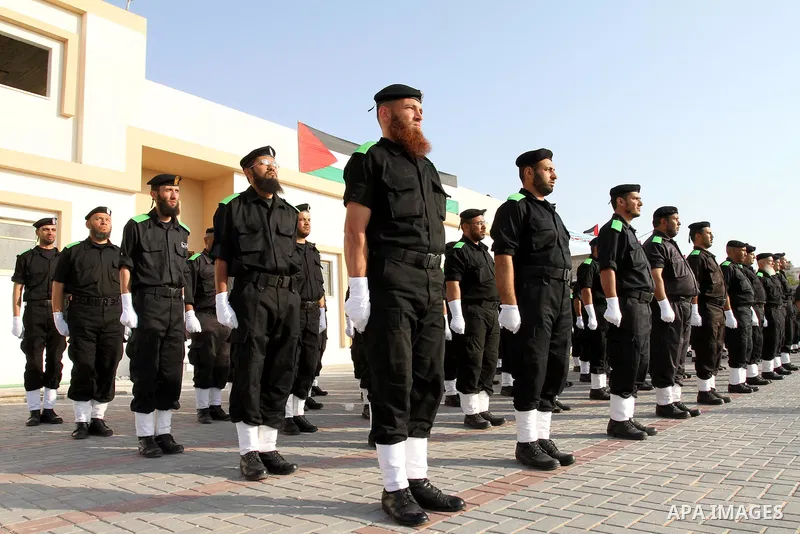 Palestinian Hamas security forces stand at attention during a graduation ceremony at the Ansar police compound in Gaza City on May 12, 2011. Photo by Mohammed Asad