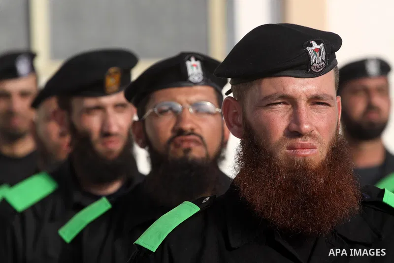 Palestinian Hamas security forces stand at attention during a graduation ceremony at the Ansar police compound in Gaza City on May 12, 2011. Photo by Mohammed Asad