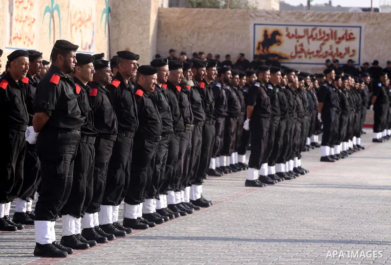 Palestinian Hamas security forces stand at attention during a graduation ceremony at the Ansar police compound in Gaza City on May 12, 2011. Photo by Mohammed Asad
