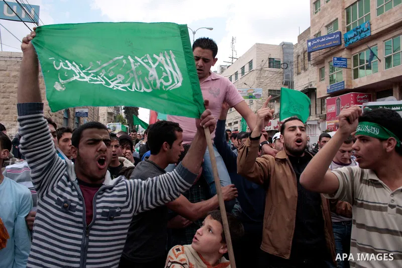 Palestinian supporters of Hamas Islamist movement attend a rally to mark the 63th anniversary of "Nakba" (catastrophe) on May 13, 2011 in the West Bank city of Hebron. Nakba means "catastrophe" in reference to the birth...