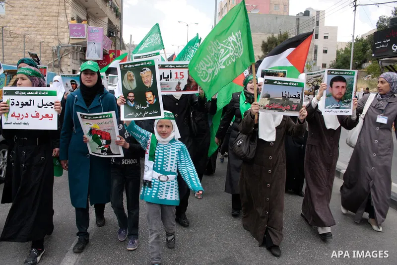 Palestinian supporters of Hamas Islamist movement attend a rally to mark the 63th anniversary of "Nakba" (catastrophe) on May 13, 2011 in the West Bank city of Hebron. Nakba means "catastrophe" in reference to the birth...