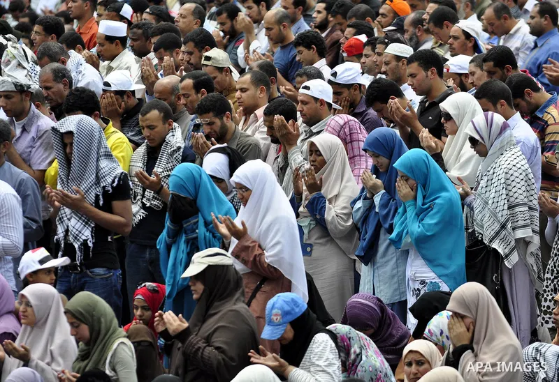Egyptians attend Friday prayers at a rally at Cairo's Tahrir Square on May 13, 2011 during a protest calling for national unity after attacks on Egyptian churches, and solidarity with the Palestinians as they mark the "N...