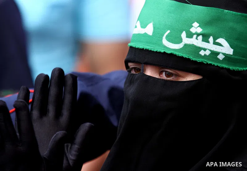 An Egyptian woman takes part in a rally at Cairo's Tahrir Square on May 13, 2011 during a protest calling for national unity after attacks on Egyptian churches, and solidarity with the Palestinians as they mark the "Nakb...