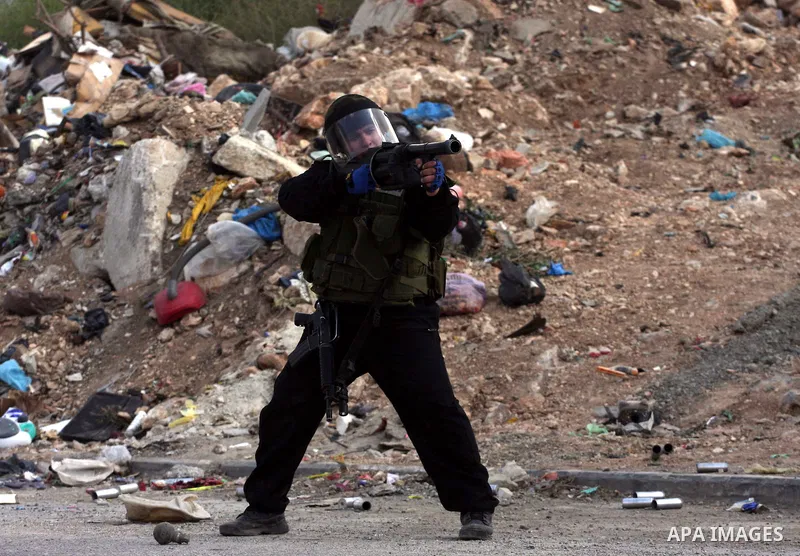 Israeli soldiers clash with Palestinian stone throwers at the Qalandia checkpoint between Jerusalem and Ramallah on May 13, 2011 following a Nakba protest. Nakba means "catastrophe" in reference to the birth of the state...