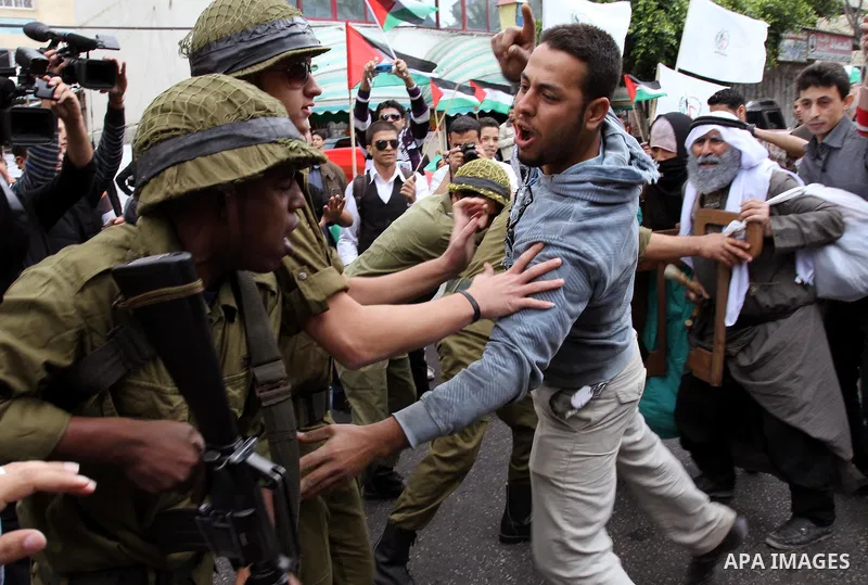 Palestinians Artists take part in a demonstration to mark the 63th anniversary of "Nakba" (catastrophe), in Gaza city, on May 14, 2011. Through the display of theatrical sketch. Nakba means "catastrophe" in reference to...