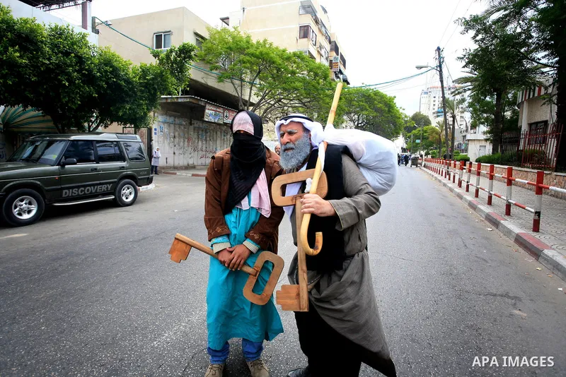 Palestinians Artists take part in a demonstration to mark the 63th anniversary of "Nakba" (catastrophe), in Gaza city, on May 14, 2011. Nakba means "catastrophe" in reference to the birth of the state of Israel 63 years...