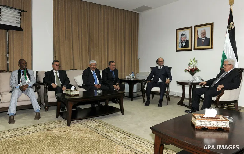 Palestinian President Mahmoud Abbas (Abu Mazen) meets with the head of International Federation of Sports Media in the West Bank city of Ramallah on May 14, 2011. Photo by Thaer Ganaim