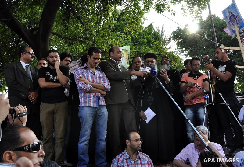 Egyptian Coptic Christians protest in front of the state television building in Cairo on May 14, 2011 against recent attempts to trigger sectarian conflict in the country. Photo by Ahmed Asad