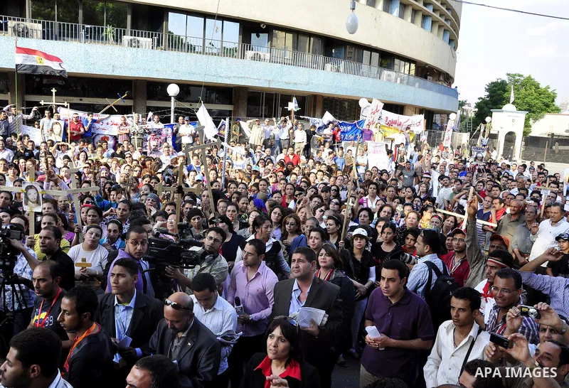 Egyptian Coptic Christians protest in front of the state television building in Cairo on May 14, 2011 against recent attempts to trigger sectarian conflict in the country. Photo by Ahmed Asad