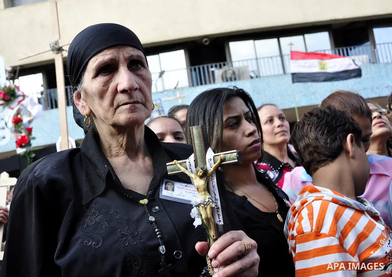 Egyptian Coptic Christians protest in front of the state television building in Cairo on May 14, 2011 against recent attempts to trigger sectarian conflict in the country. Photo by Ahmed Asad