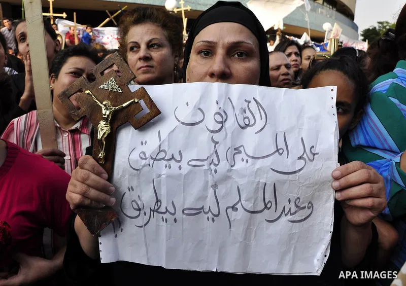 Egyptian Coptic Christians protest in front of the state television building in Cairo on May 14, 2011 against recent attempts to trigger sectarian conflict in the country. Photo by Ahmed Asad