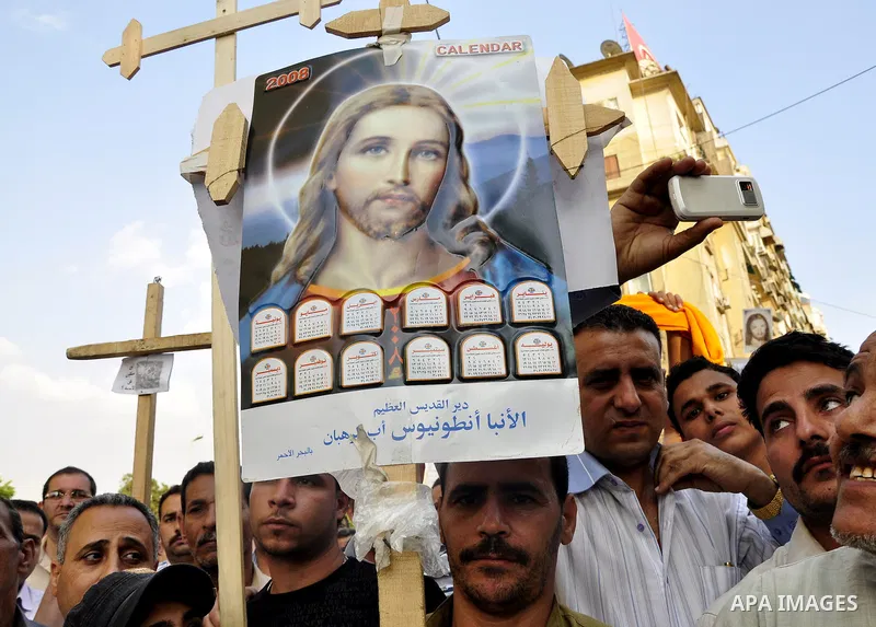 Egyptian Coptic Christians protest in front of the state television building in Cairo on May 14, 2011 against recent attempts to trigger sectarian conflict in the country. Photo by Ahmed Asad