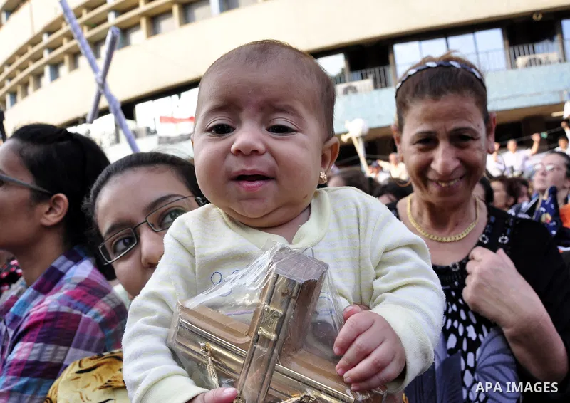 Egyptian Coptic Christians protest in front of the state television building in Cairo on May 14, 2011 against recent attempts to trigger sectarian conflict in the country. Photo by Ahmed Asad