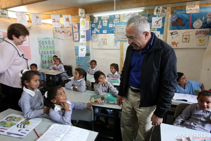 Palestinian Prime Minister, Salam Fayyad during a tour on May 15, 2011 with Ms. Valerie Amos Under-Secretary-General and Emergency Relief Coordinator and Ms. Kristalina Georgieva the EU Commissioner for International Coo...