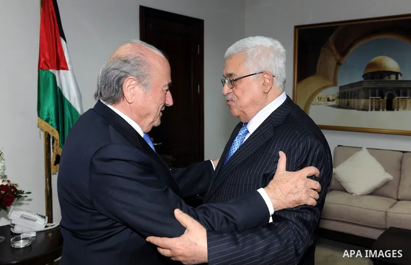 Palestinian President Mahmoud Abbas (Abu Mazen) during a meeting with the prime FIFA World Football Federation, Mr. Blatter, and Prince Ali bin Hussein, head of the Jordanian Federation of football in the west bank city...