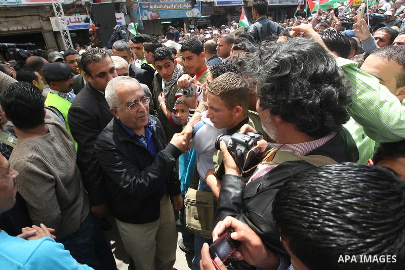 Palestinian Prime Minister, Salam Fayyad takes part in a rally marking the 63rd anniversary of 'Nakba', Arabic for 'Catastrophe', the term used to mark the events leading to Israel's founding in 1948 in the West Bank cit...