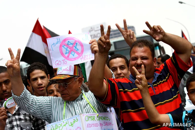Egyptian protesters take part in a protest in front of the Israeli embassy in Cairo on May 15, 2011 in solidarity with Palestinians who mourned the "nakbah" anniversary of Israel's creation in 1948, as a result of which...