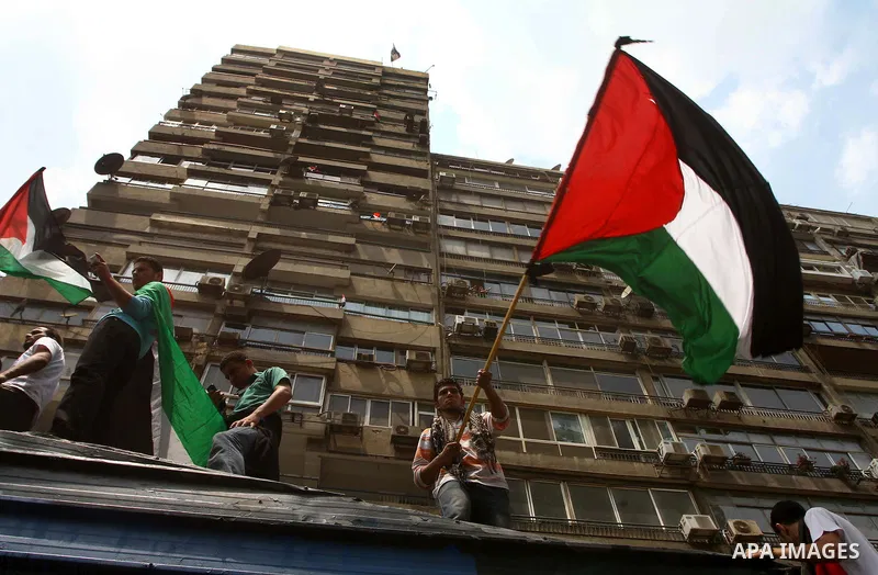 Egyptian protesters take part in a protest in front of the Israeli embassy in Cairo on May 15, 2011 in solidarity with Palestinians who mourned the "nakbah" anniversary of Israel's creation in 1948, as a result of which...